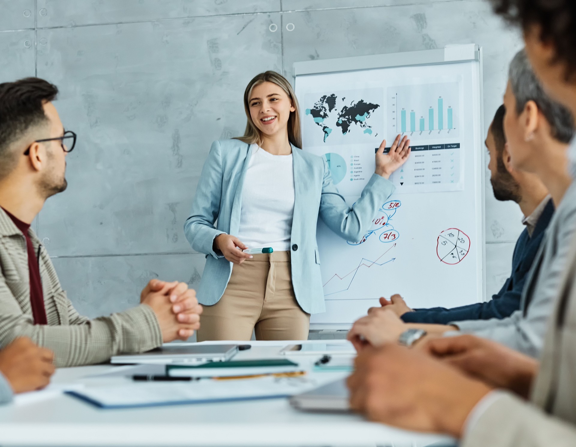 young business people meeting office teamwork group whiteboard presentation seminar woman businesswoman startup project idea